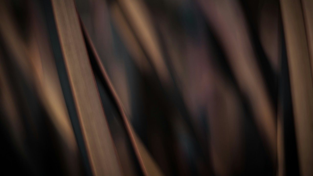 Textured gold metallic background surface.