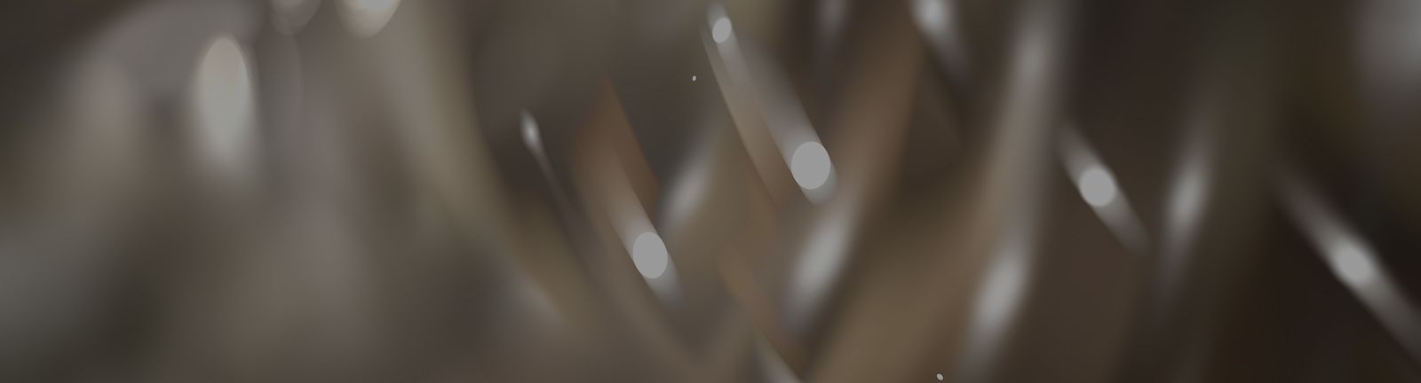 Abstract light patterns blending in soft colors.