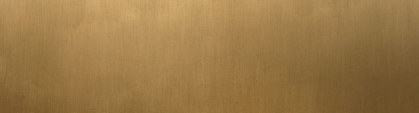 Brushed gold metallic texture background.
