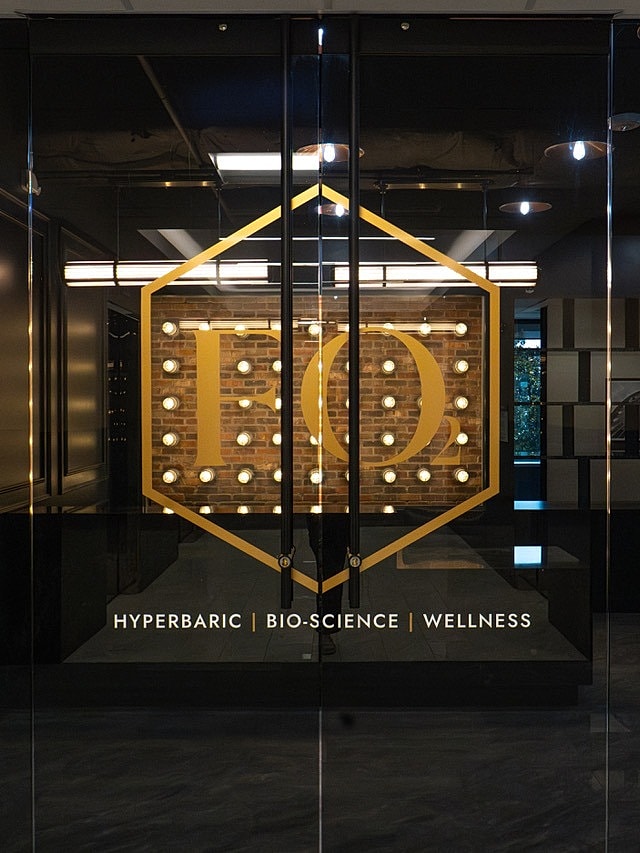 Door with wellness and bio-science branding.